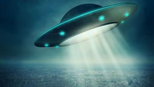 UFO flying in a dark sky